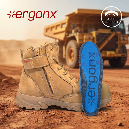 ErgonX Helium all-tan safety boot and blue orthotic insole on an Australian mining site